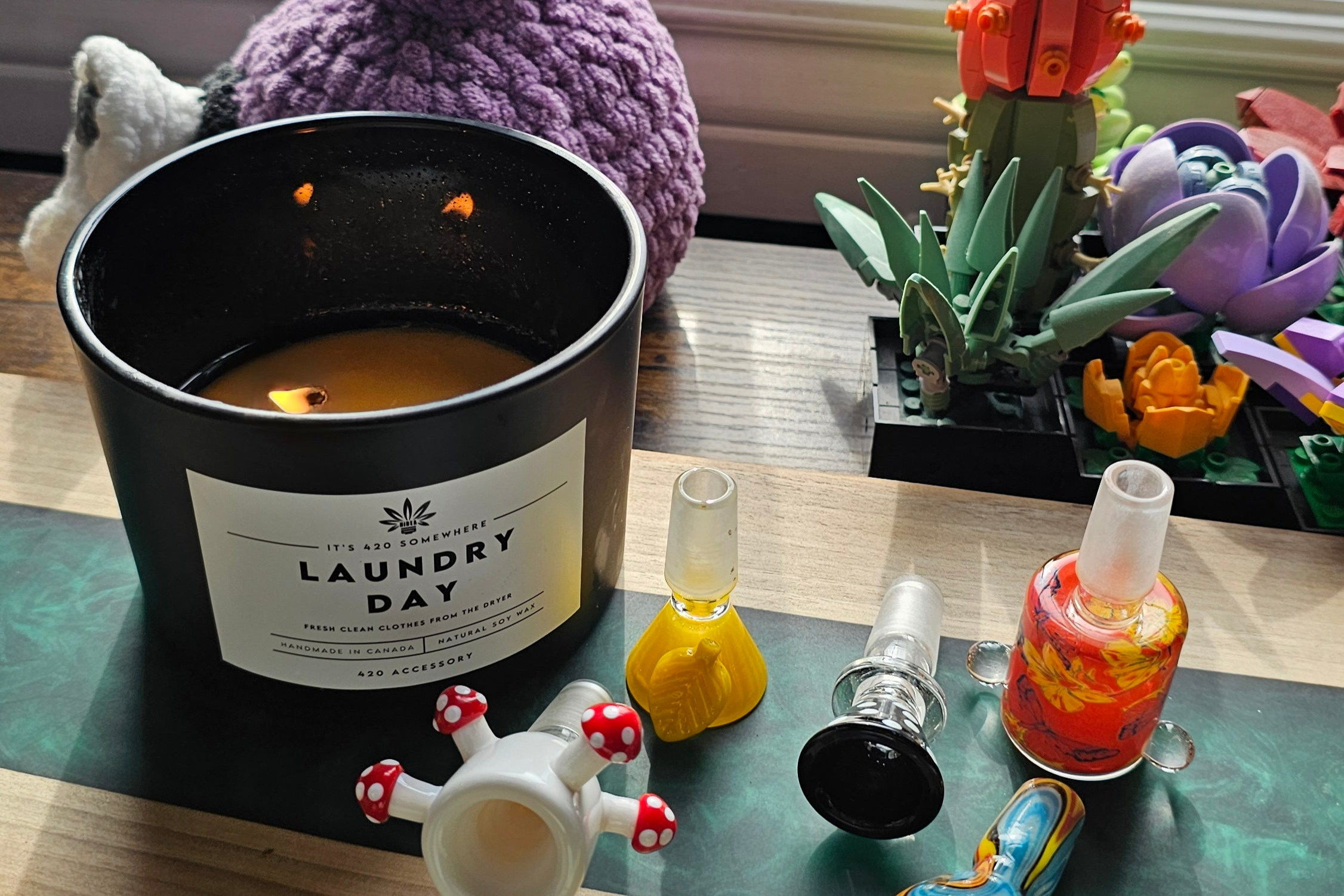 laundry day scented candle burning showing some of the 14mm glass slider bowls hidden inside
